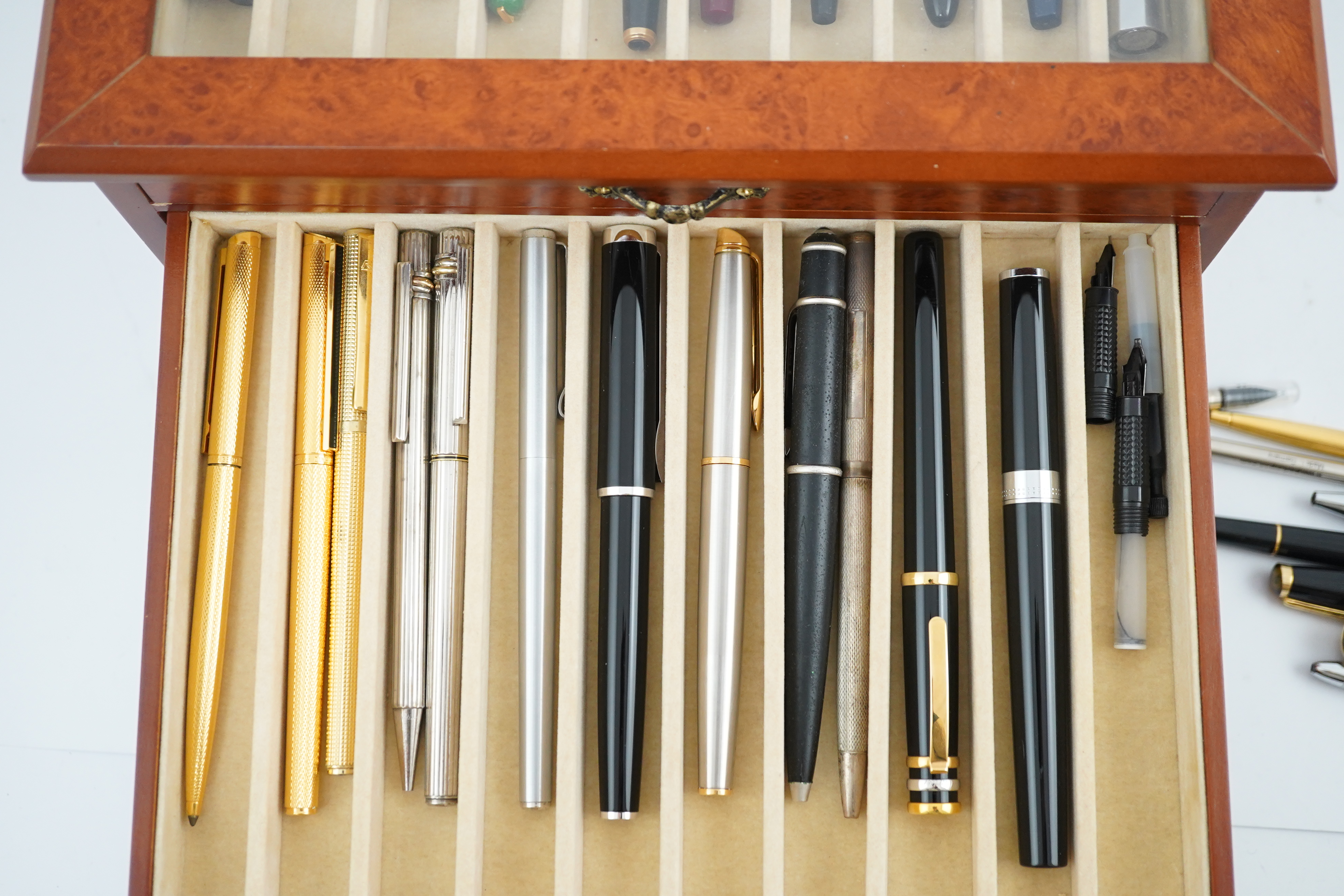 A large quantity of pens etc. and collector's cabinet